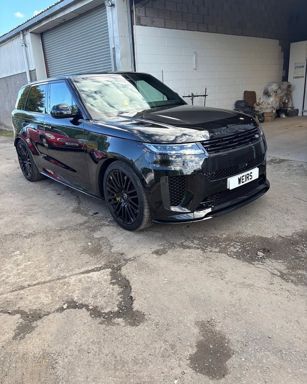Black Range Rover outside the Weir workshop
