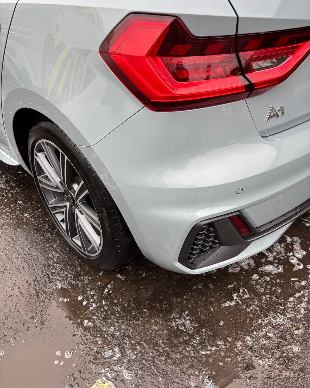 White Audi rear bumper after repair